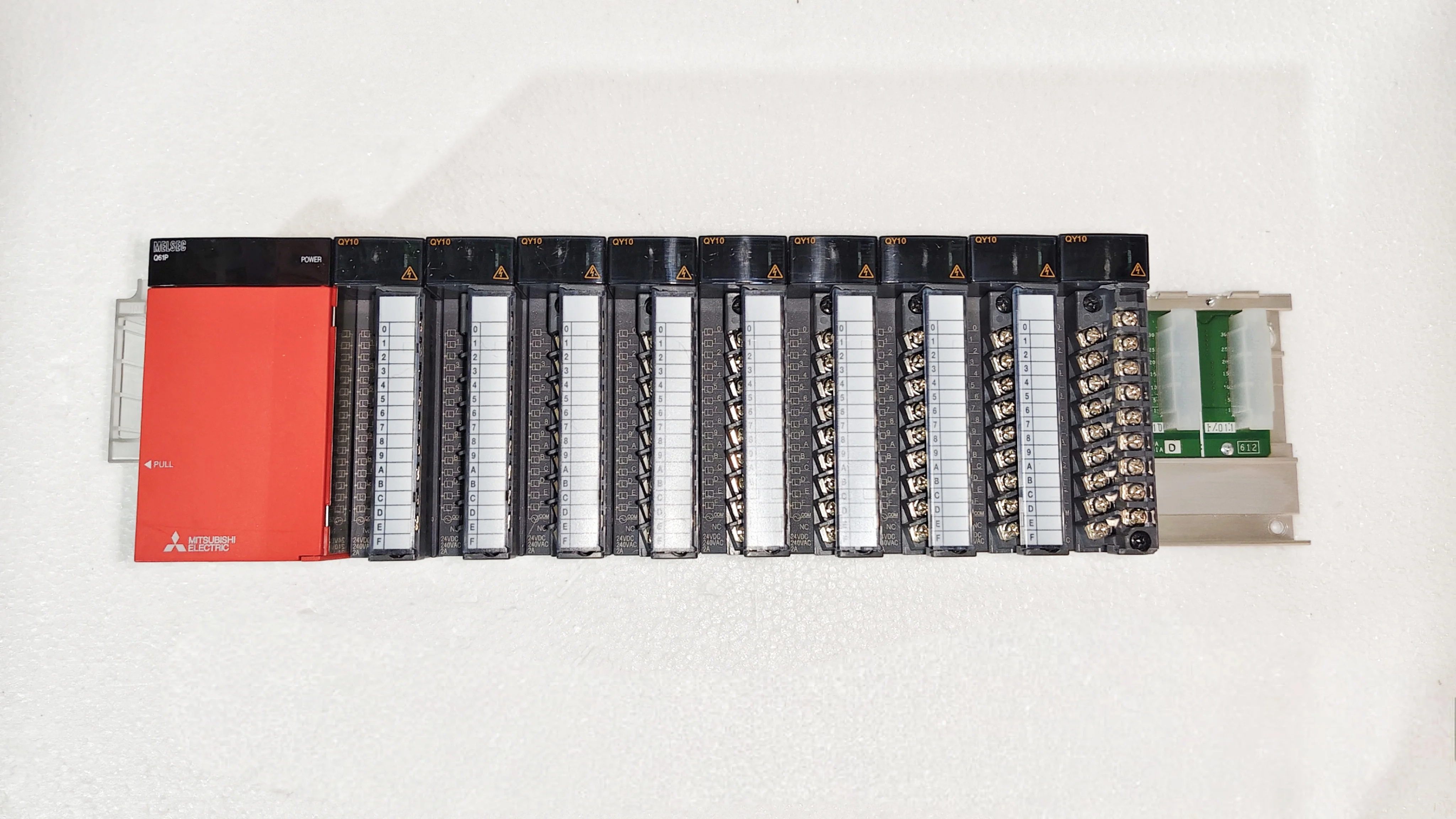 Mitsubishi Melsec PLC with Q61P Power Supply & QY10 09 Pcs in Rack